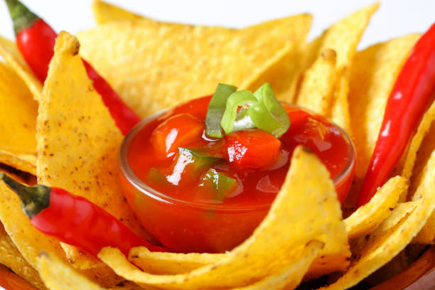 istock Nachos with homemade salsa dip 672032780