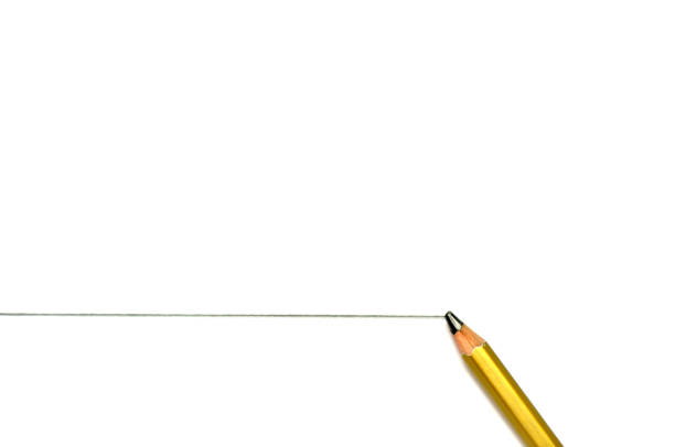crayon or isolé sur fond blanc pur avec ligne - pen writing instrument pencil gold photos et images de collection