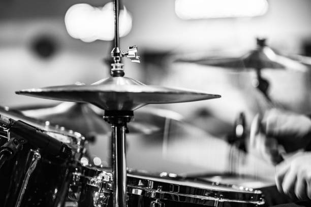 istock Drummer playing drums with hihat in the foreground 672039510