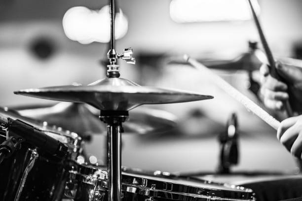 istock Drummer playing snare drum with hihat in the foreground 672039528