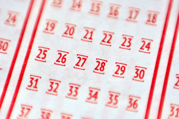 istock Marking Number On Lottery Ticket 672039560