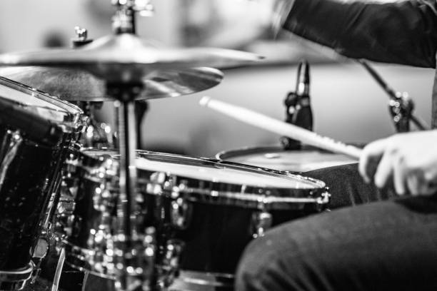 istock Drummer playing drums with hihat in the foreground 672039662