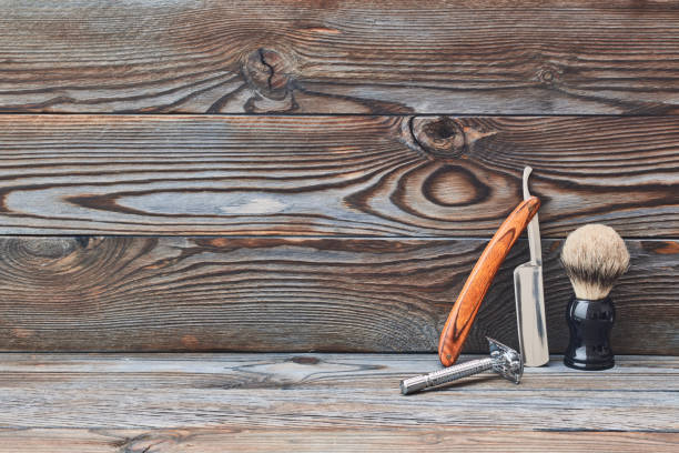 istock Vintage barber shop tools on wooden background 672040688