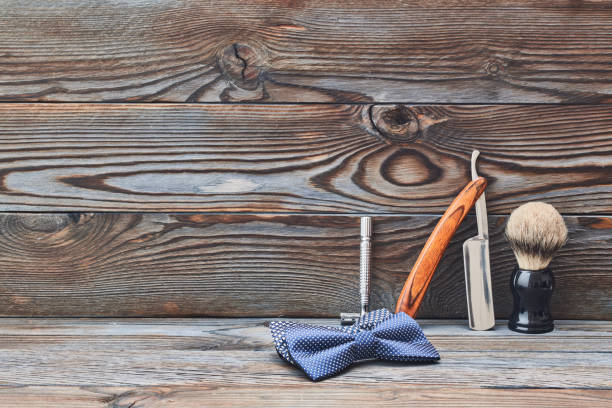 istock Vintage barber shop tools on wooden background 672040692