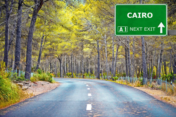 cairo road sign against clear blue sky - tourism outdoors egypt africa imagens e fotografias de stock