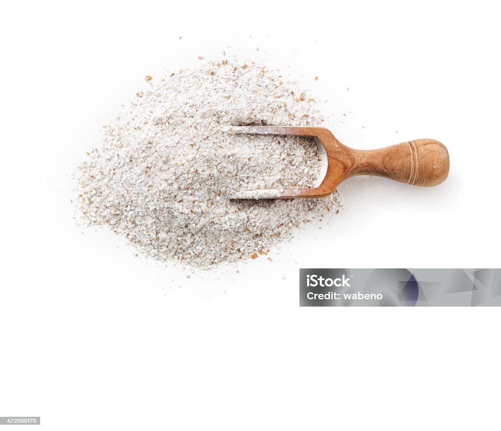 Rye flour Rye flour in scoop on white background Flour Stock Photo