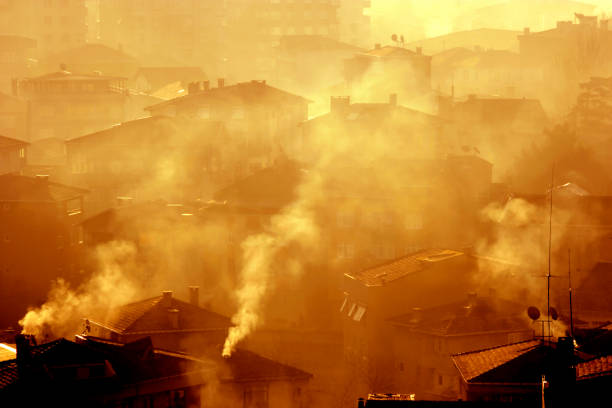 istock houses and smoke 672060884