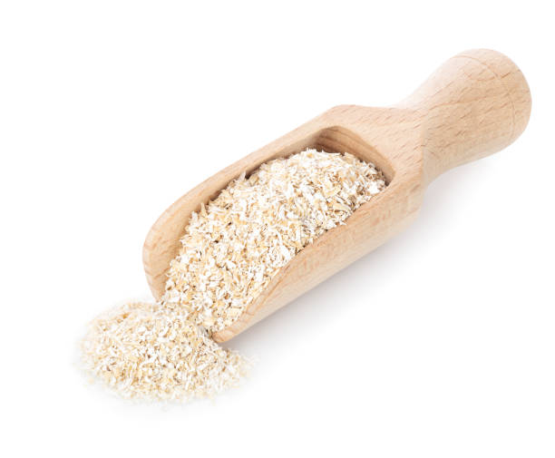 istock bran in wooden scoop 672063864