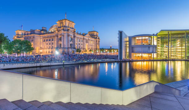 istock Berlin government district with Reichstag and Spree river in twilight, central Berlin Mitte, Germany 672064722