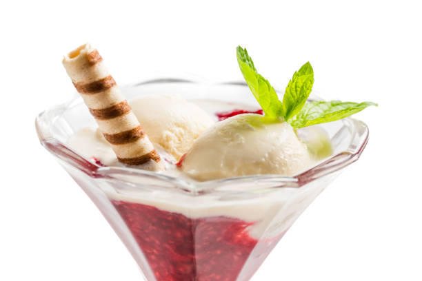 istock Vanilla ice cream and hot raspberry mousse on white background 672074710