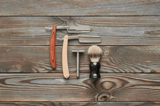 istock Vintage barber shop tools on wooden background 672085488