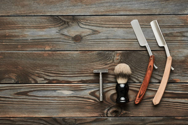 istock Vintage barber shop tools on wooden background 672086002