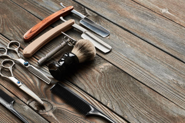 istock Vintage barber shop tools on wooden background 672087168