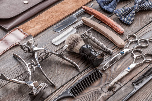 istock Vintage barber shop tools on wooden background 672087430
