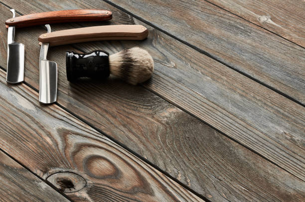 istock Vintage barber shop tools on wooden background 672088206