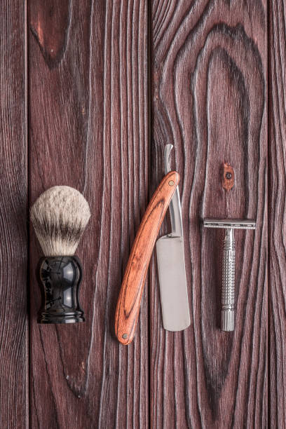 istock Vintage barber shop tools on wooden background 672089538