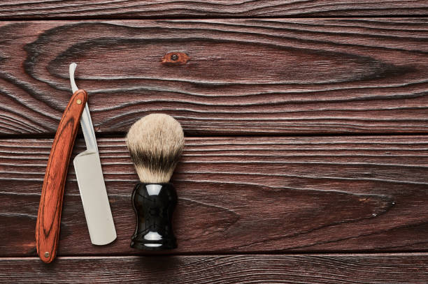 istock Vintage barber shop tools on wooden background 672089544