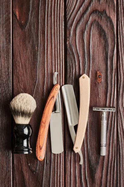 istock Vintage barber shop tools on wooden background 672089558