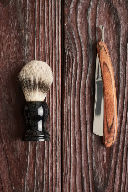 istock Vintage barber shop tools on wooden background 672089586