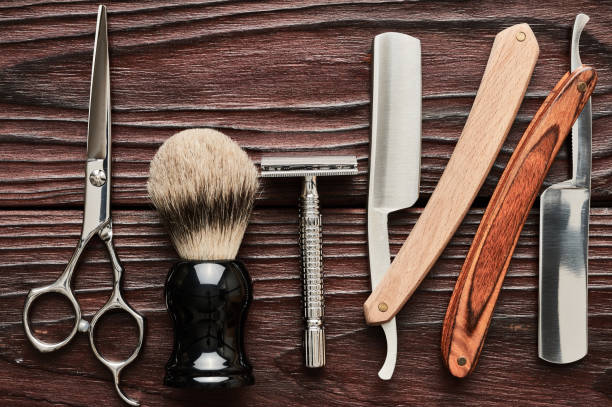 istock Vintage barber shop tools on wooden background 672089622