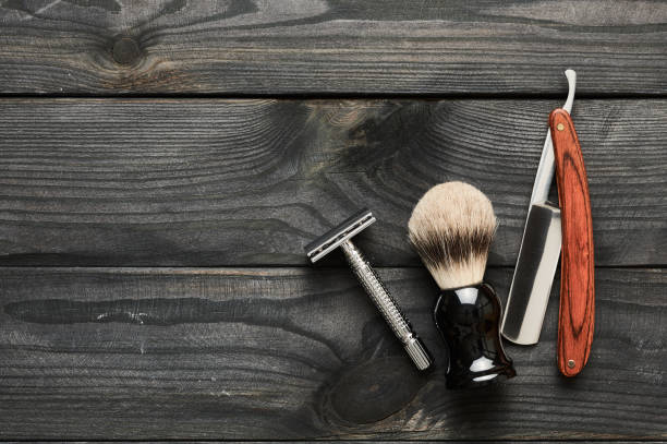 istock Vintage barber shop tools on wooden background 672089638