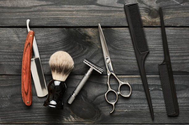 istock Vintage barber shop tools on wooden background 672089642