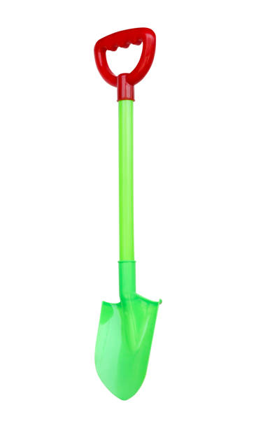 istock shovel with a handle on a white background, plastic shovel toys for children. 672089720