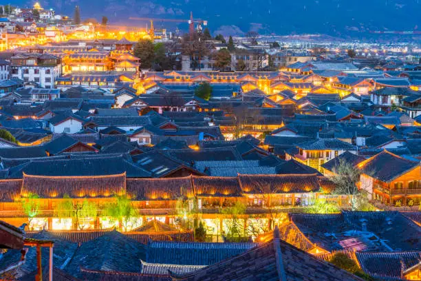 Lijiang Old Town mountain top view with local historical architectures, Yunnan,China