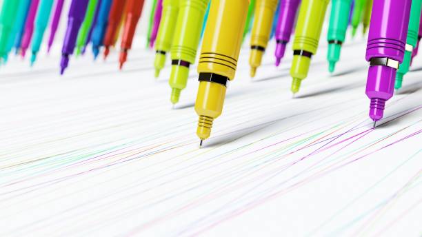 istock Macro Perspective on Brightly Colored Finepoint Mechanical Drawing Pens Making Perfect Marks on a Seamless White Surface 672090264