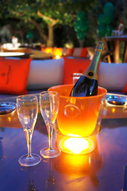 istock Champagne bottle and two glasses 672099354