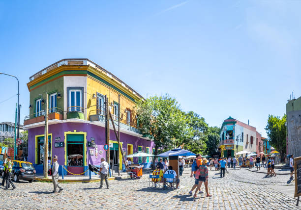 Colorful La Boca area - Buenos Aires, Argentina Buenos Aires - January, 2016: Tourists visiting the Colorful La Boca area - Buenos Aires, Argentina caminito stock pictures, royalty-free photos & images