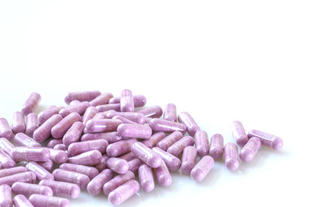 cranberry ergänzungen - pink pill stock-fotos und bilder