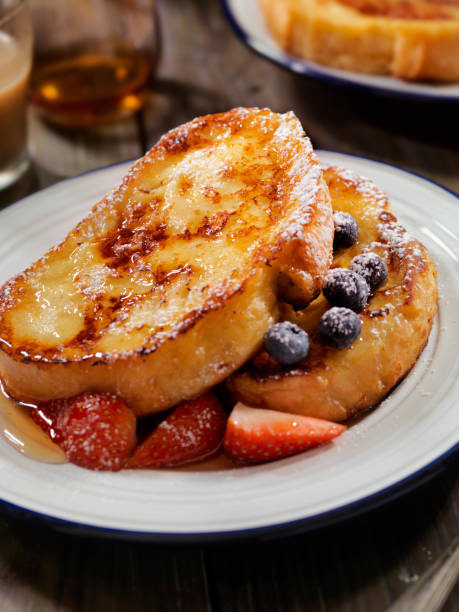 istock French Toast with Maple Syrup and Berries 672110050