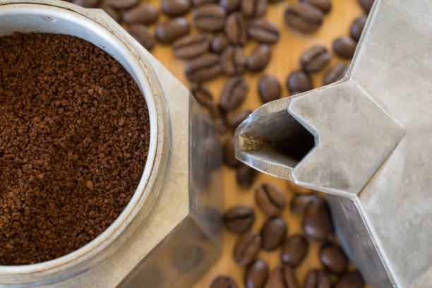 istock Ground coffee in moka pot. 672112782
