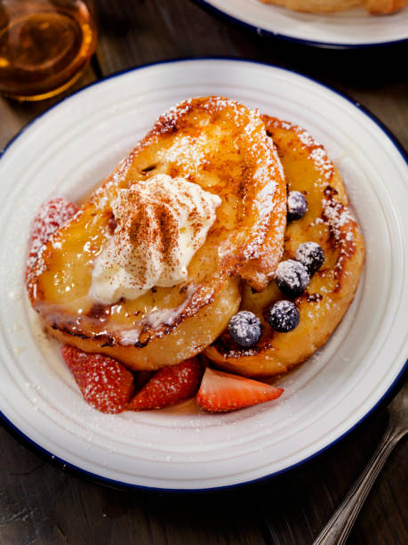 istock French Toast with Maple Syrup and Berries 672113454