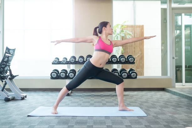 istock woman do yoga 672119726