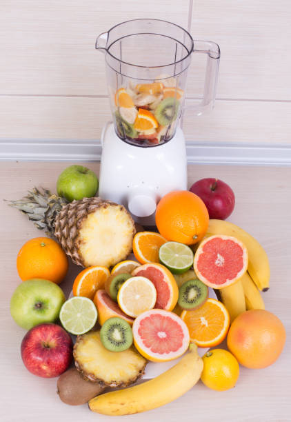 istock Blender with group of fruits 672123936