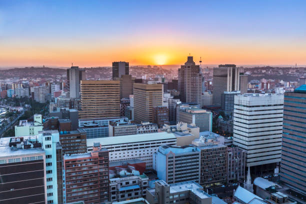 istock Durban cityscape centre with the sun setting 672126258