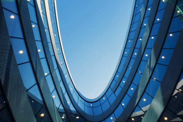 istock A part of modern business building against blue sky 672126262