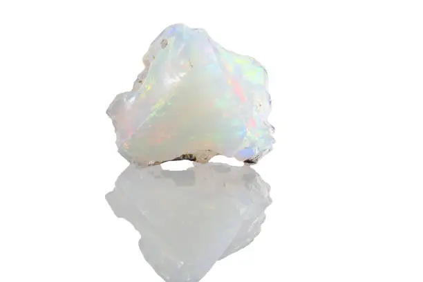 Sample of a beautiful Opal  speciment isolated on white  background