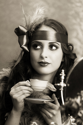 Vintage style woman with espresso