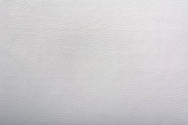 White leather texture. White leather texture. The fine granularity. leather white hide textured stock pictures, royalty-free photos & images