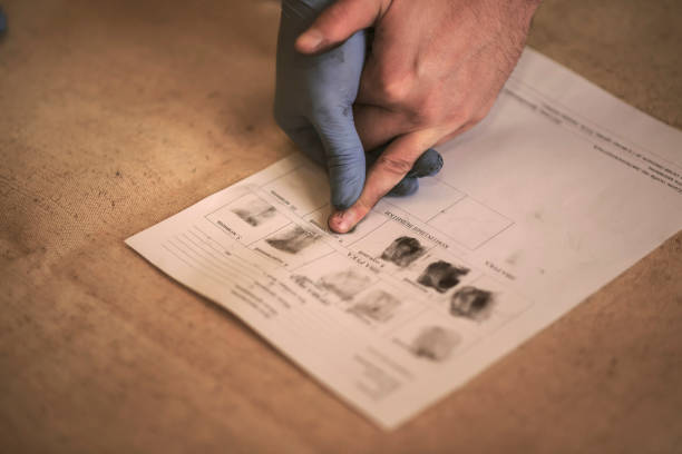 istock The process of getting samples of fingerprints hands for further study 672140660