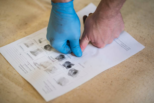 istock The process of getting samples of fingerprints hands for further study 672140674