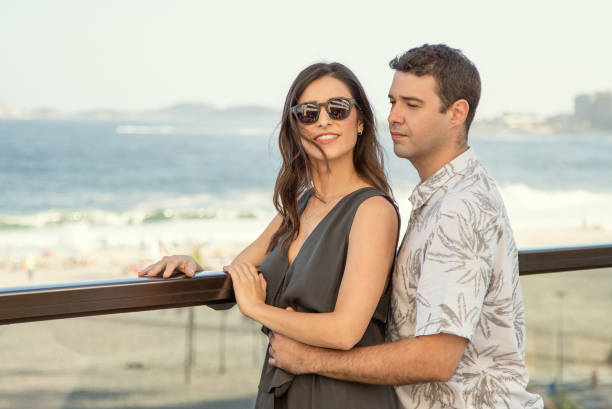 istock Young couple at balcony 672143732