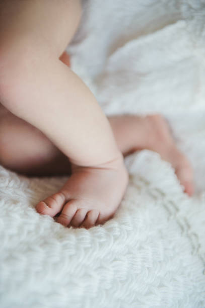 istock Toddler's feet. Baby's feet. 672156424