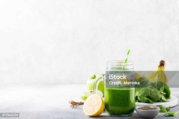 Healthy Green Smoothie With Spinach In Glass Jar Stock Photo - Download Image Now - Smoothie, Detox, Blender