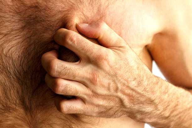 istock The man grabbed his chest with his hand 672163496