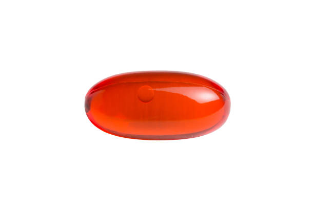 istock Orange Gelatin Capsule Isolated on White 672166252