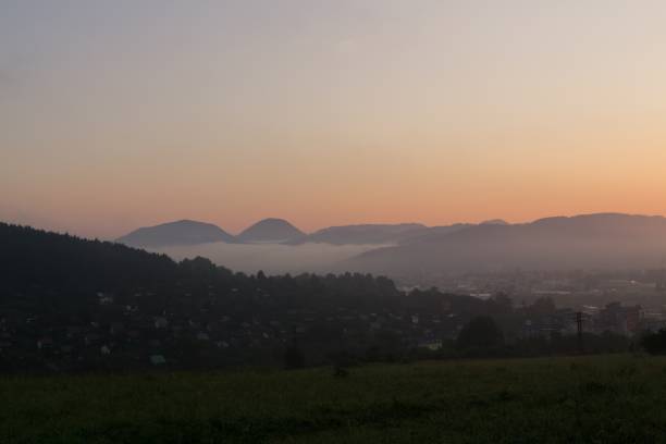 istock Sunrise with mist below mountains. Slovakia 672166494